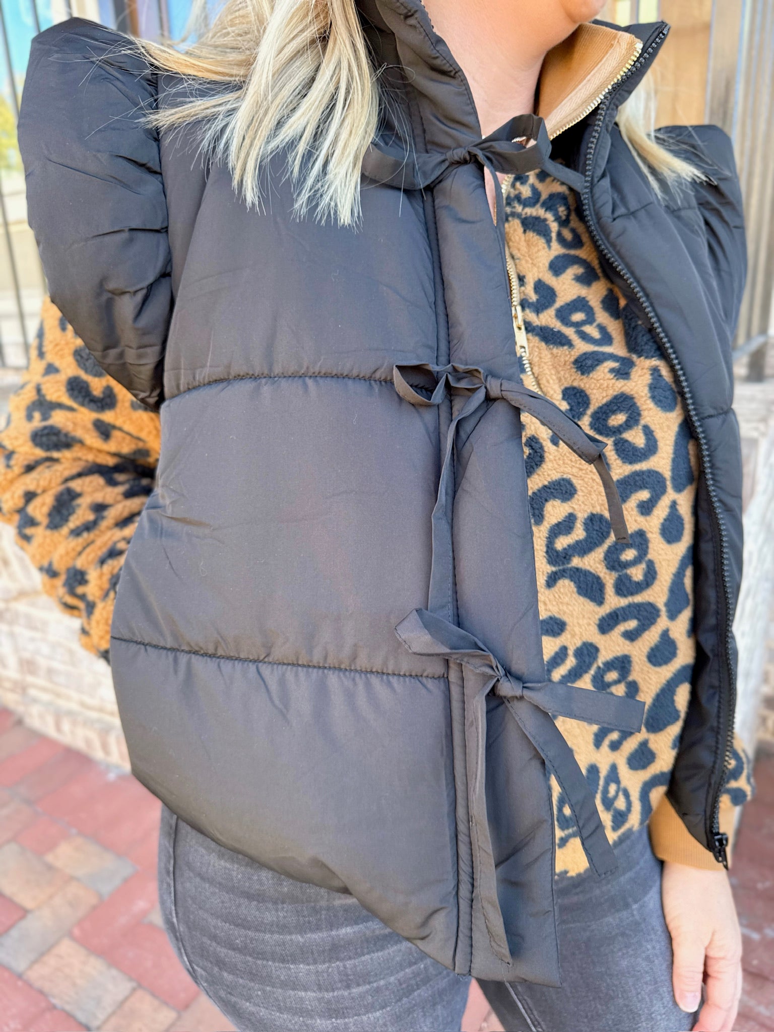 Show You Love Flutter Sleeve Zip Up Puffer Vest in Black