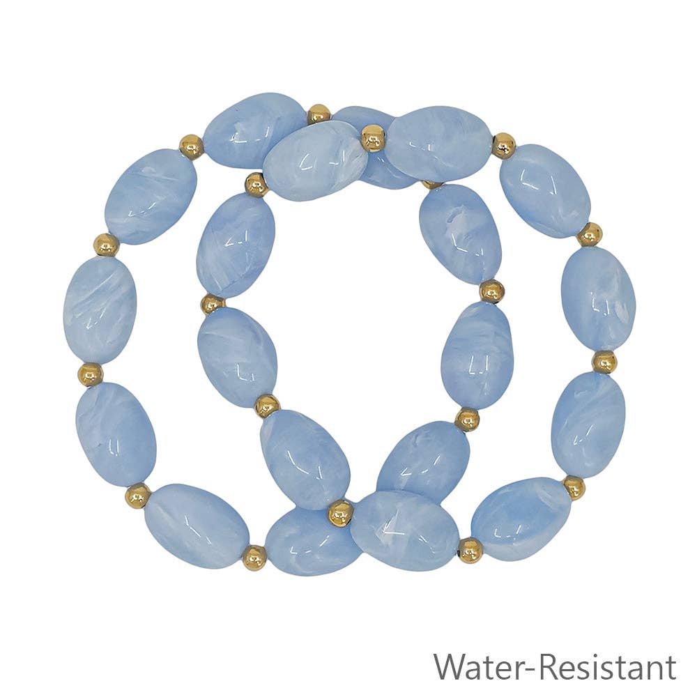 Set of 2 Light Blue Oval Acrylic and Gold Beaded Stretch Bracelets