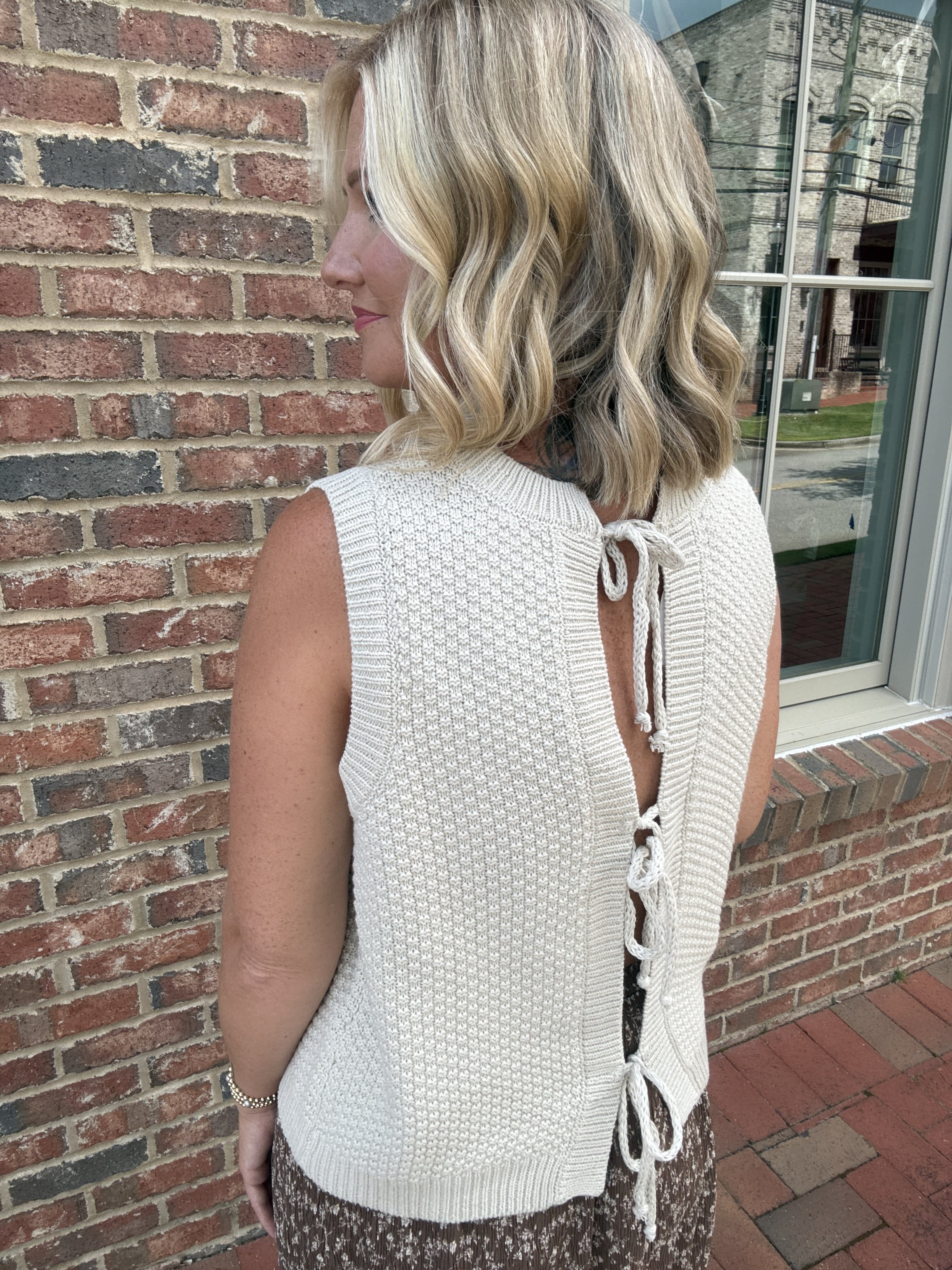 Just Call It Textured Back Ties Sleeveless Knit Top