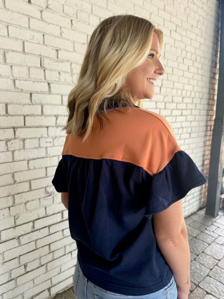 Turning Around Color Block French Terry Ruffled Top