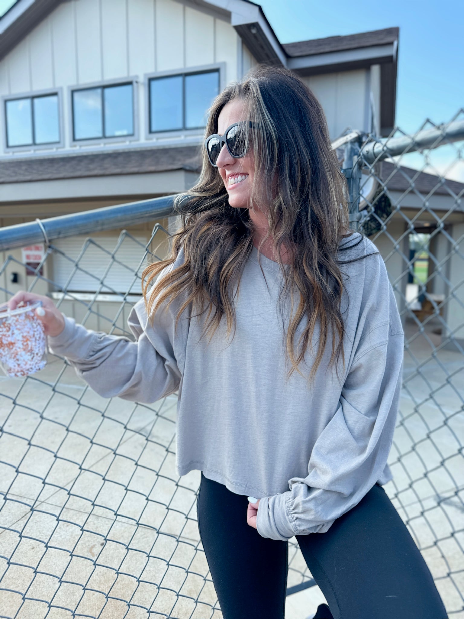I'm Getting Through It Cotton Open Back Long Sleeve Top in Taupe