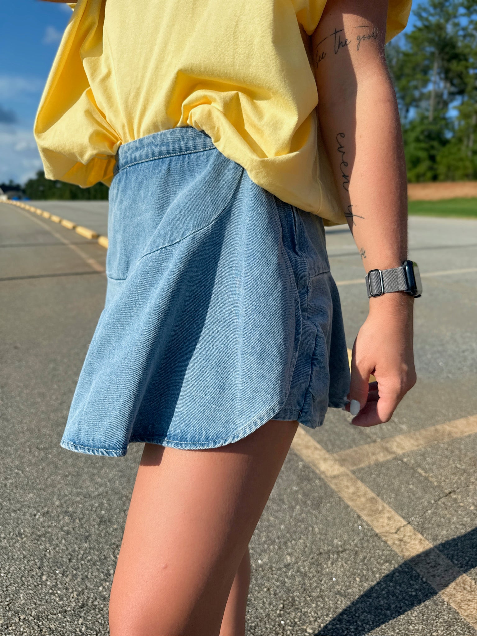 Take Me To The Stadium Wrap Ruffle Front Denim Mini Skort