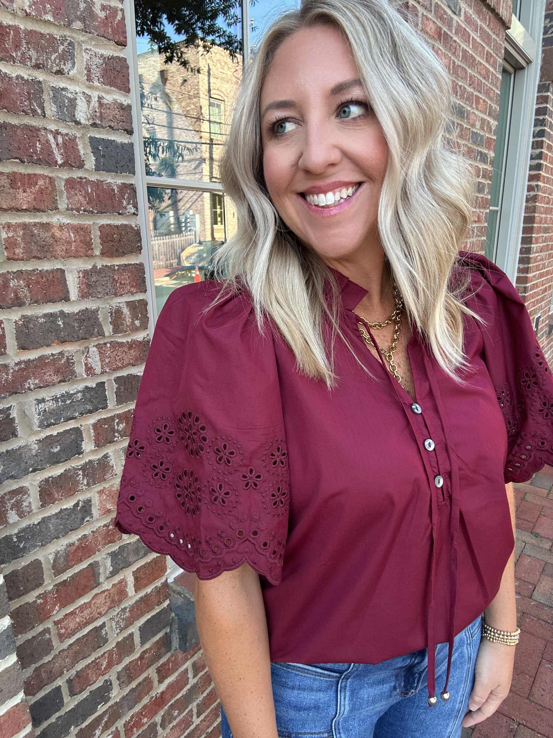 Not So Fast Eyelet Sleeve Flowy Top in Burgundy