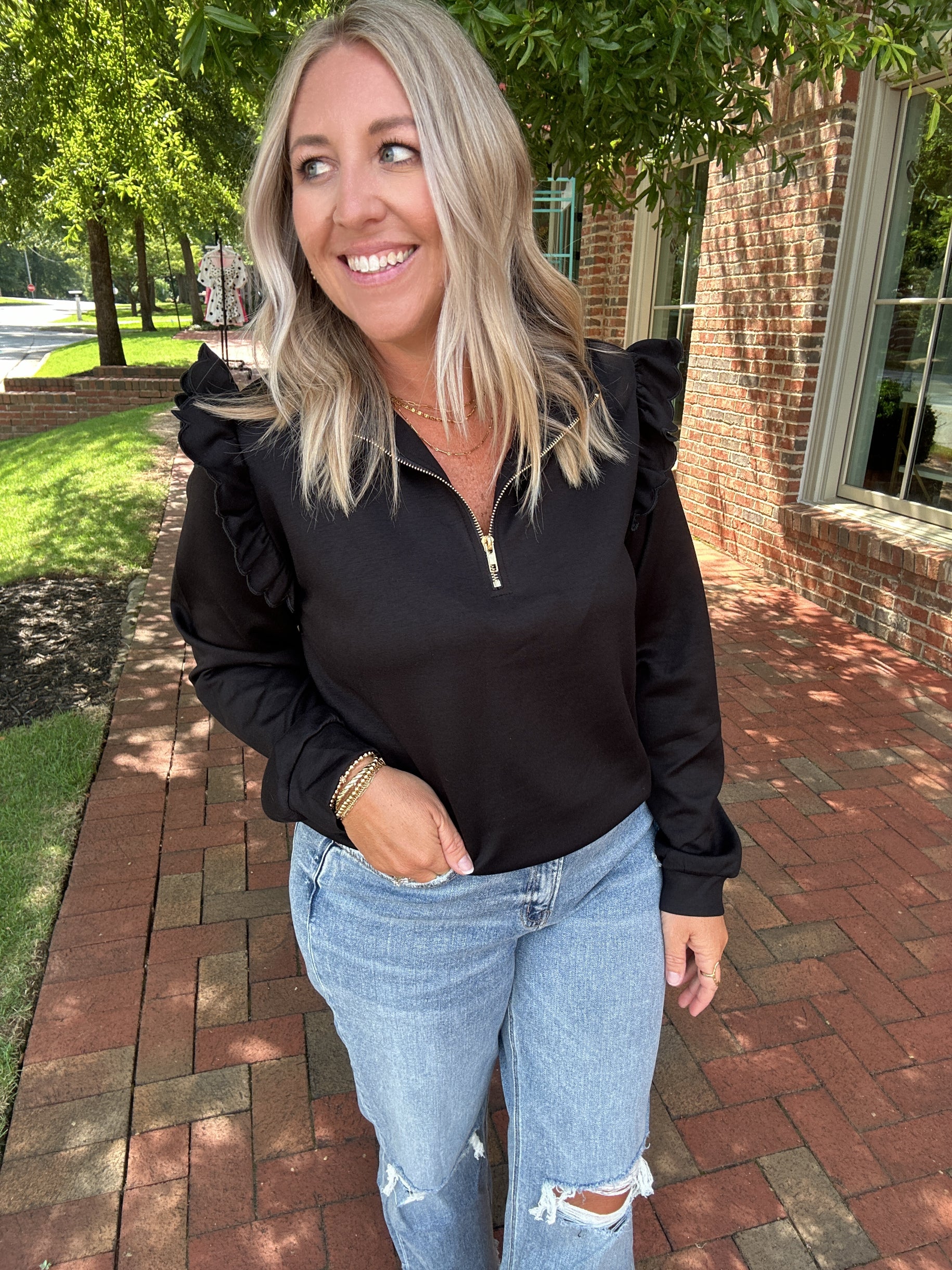 Catch A Feeling Luxe Knit Ruffle Long Sleeve Half Zip Top in Black