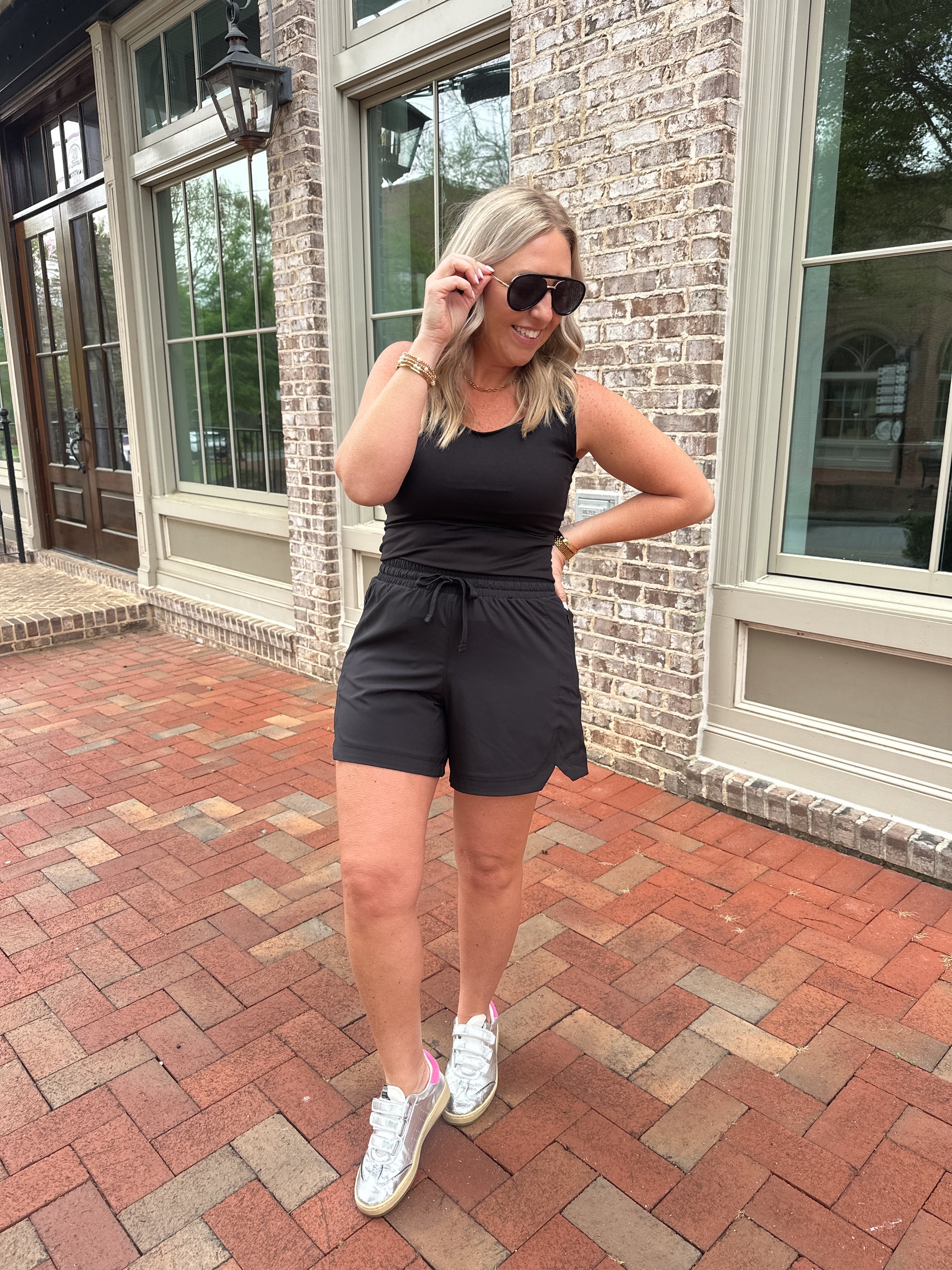 Take The Win Yoga Round Neck Sleeveless Tank in Black