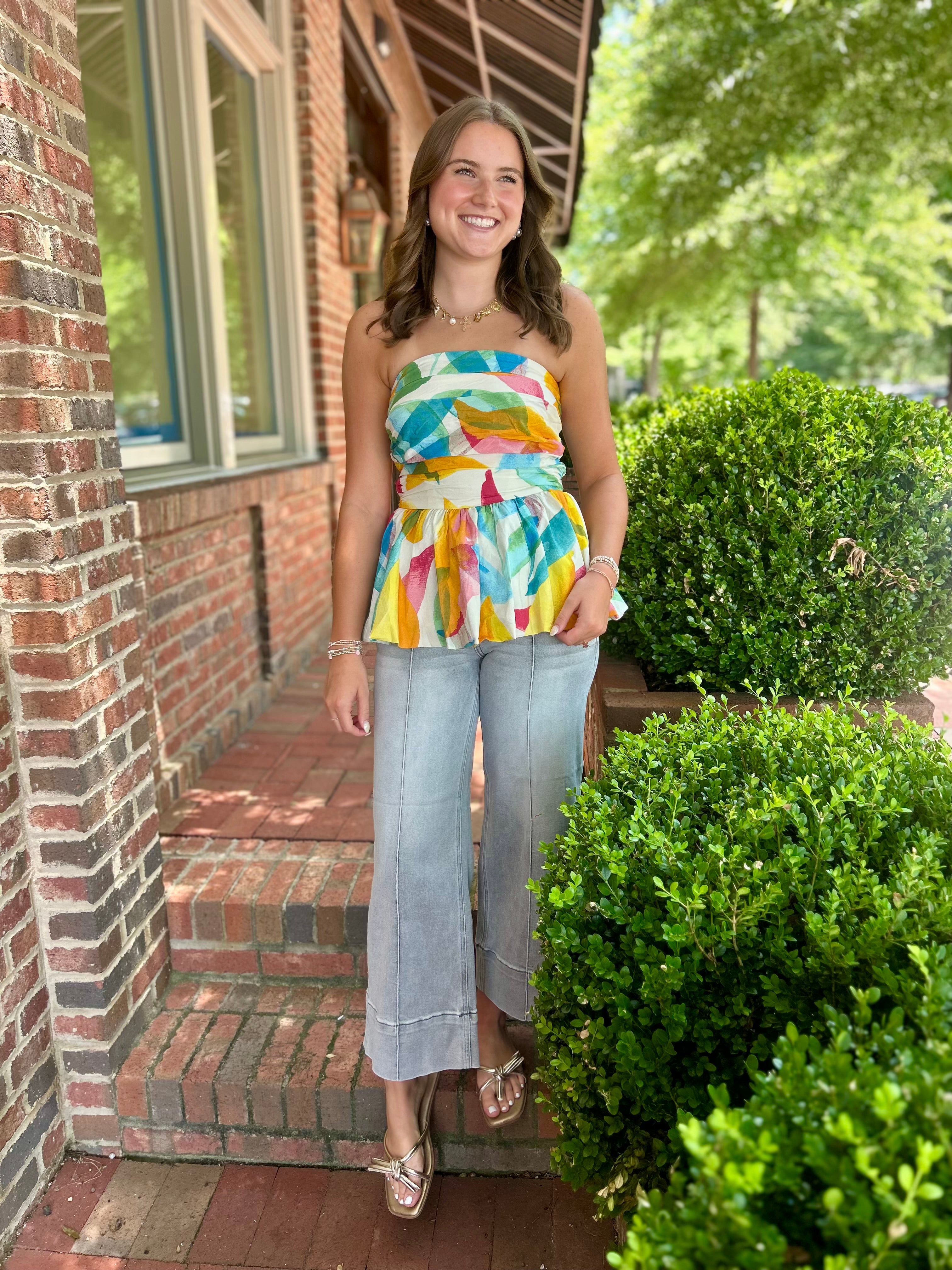 Involved In Abstract Print Strapless Peplum Top