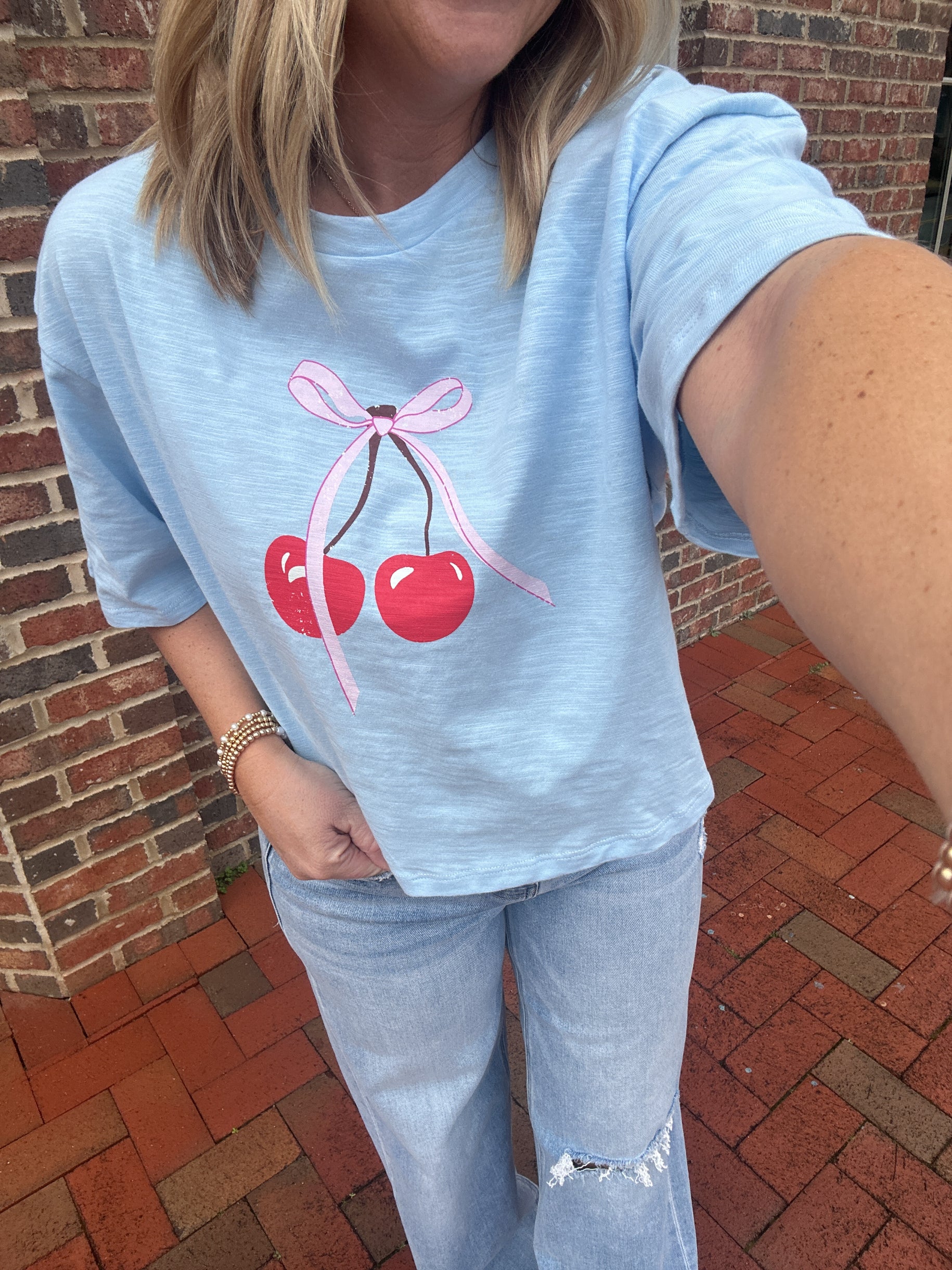 Cherry on Top with Bow Short Sleeve Cropped Top In Blue