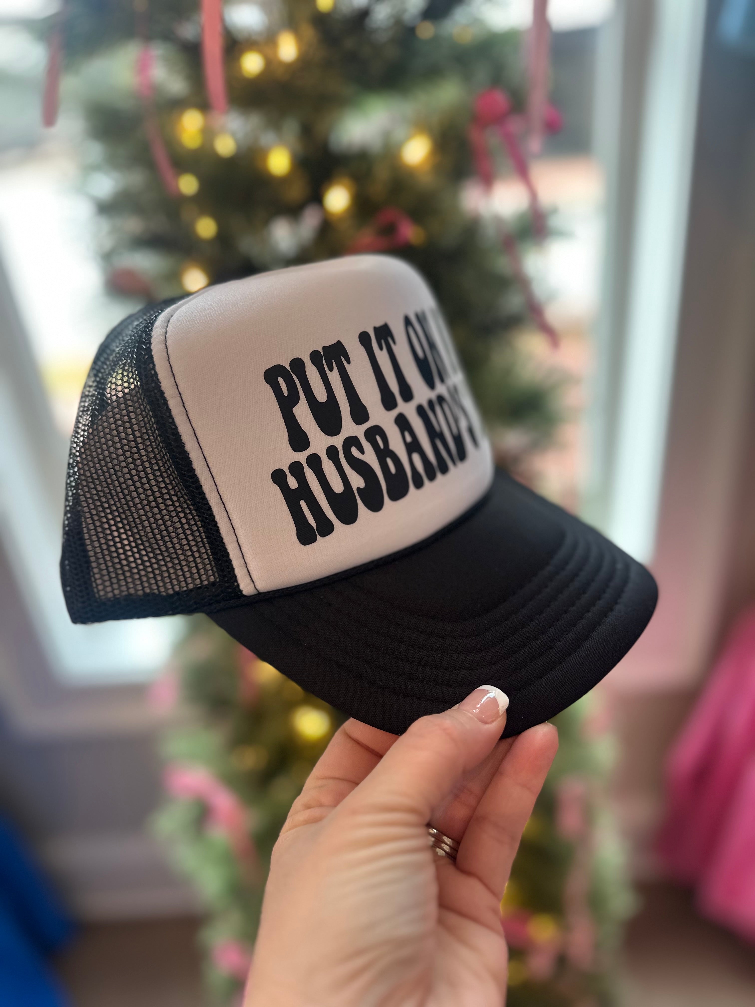 Put It On My Husband’s Tab Trucker Hat