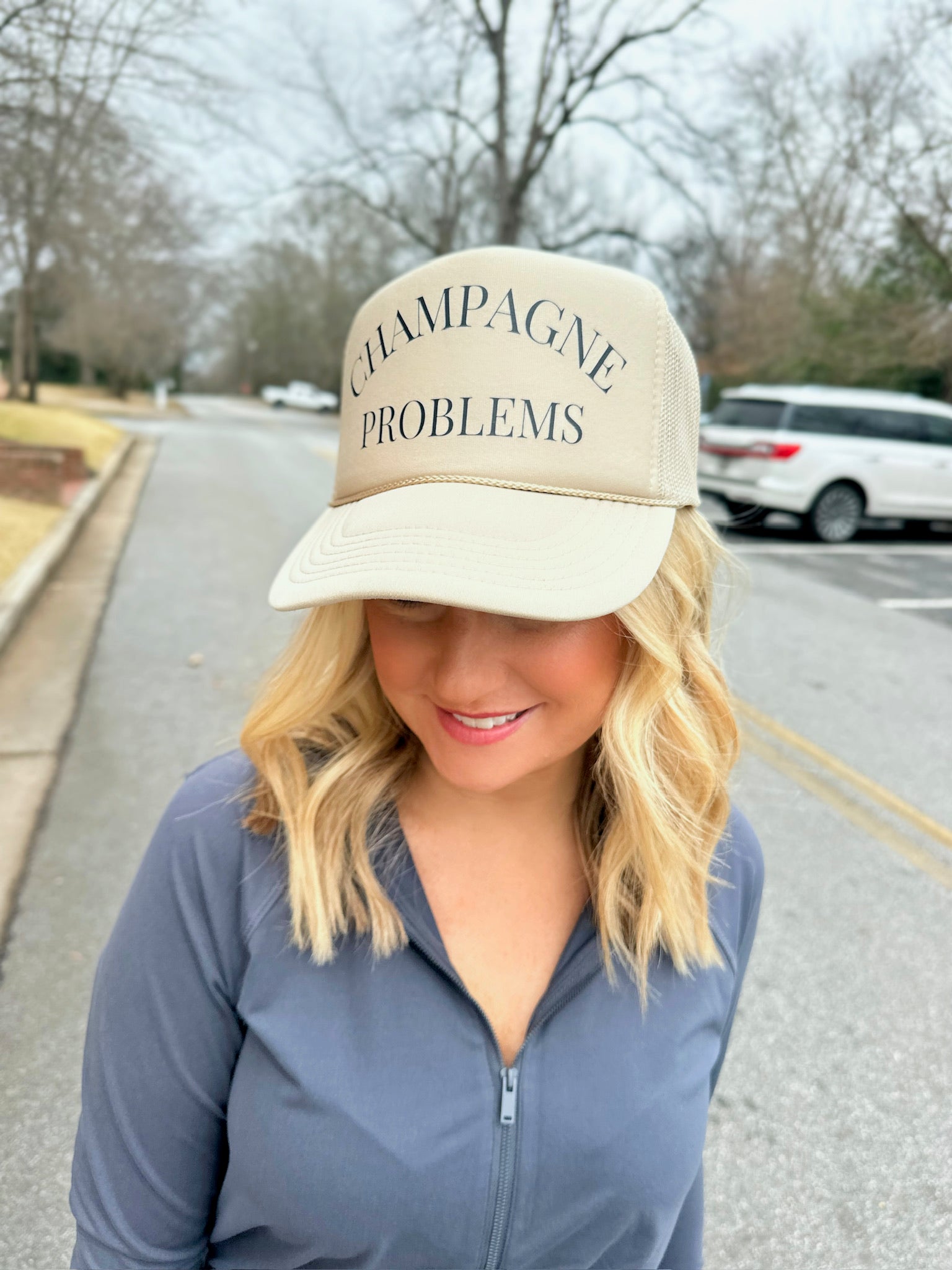 Champagne Problems Trucker Hat