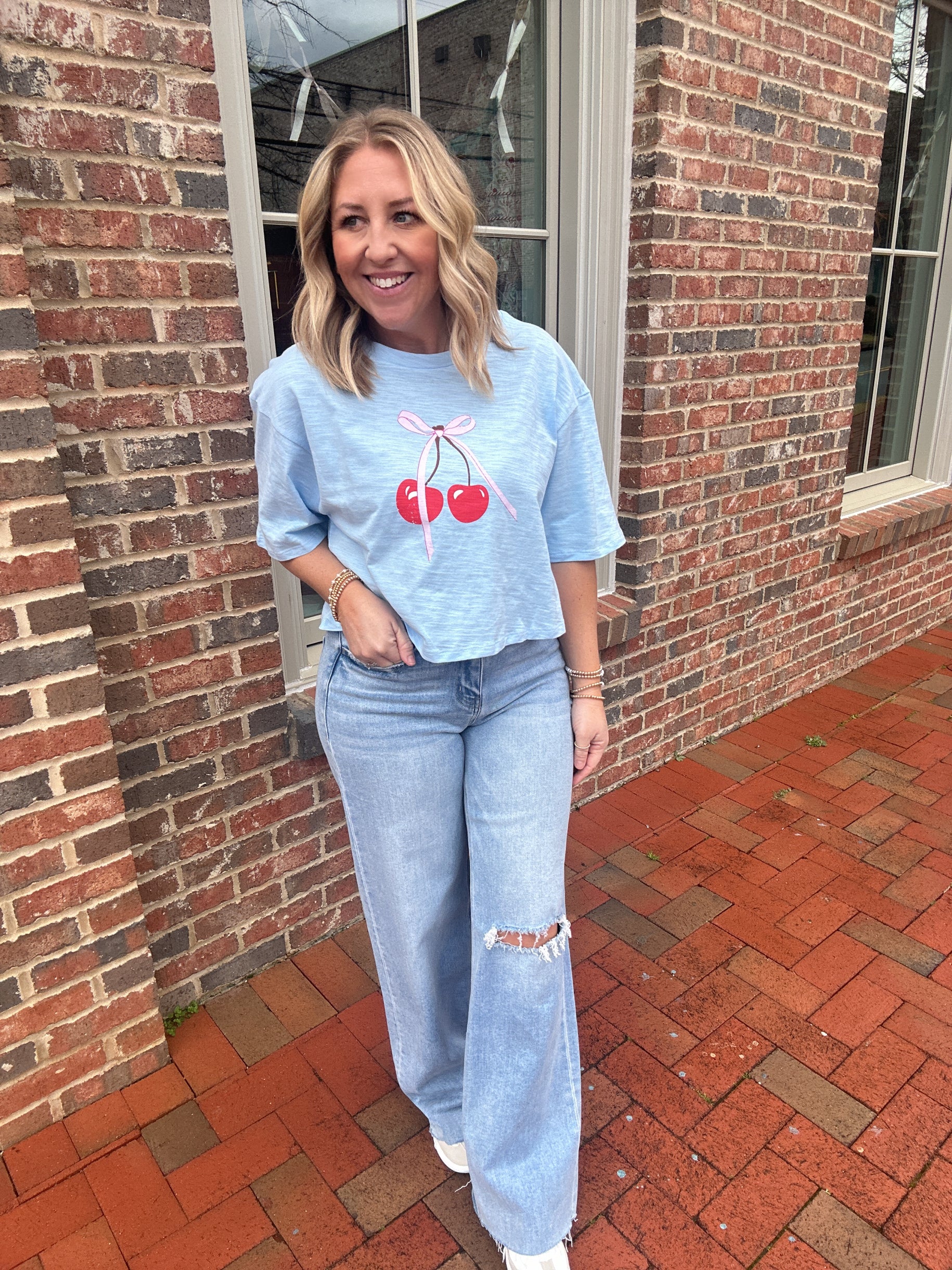 Cherry on Top with Bow Short Sleeve Cropped Top In Blue